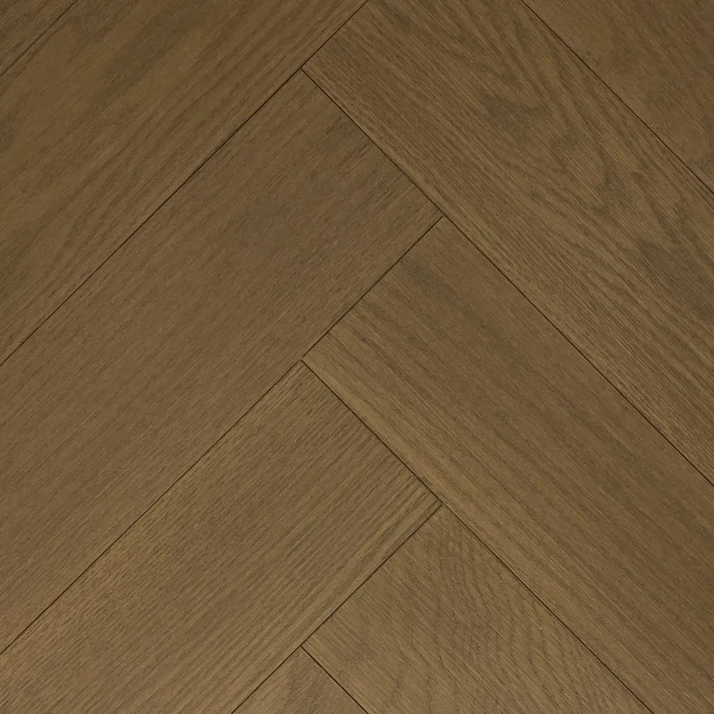 Close-up of wooden flooring with a herringbone pattern