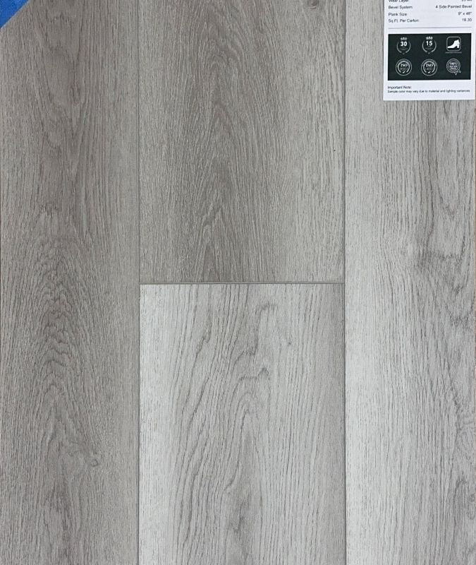 Frosted Ash SPC vinyl plank samples, showcasing smooth matte finish, high durability, and easy maintenance for residential or commercial projects.