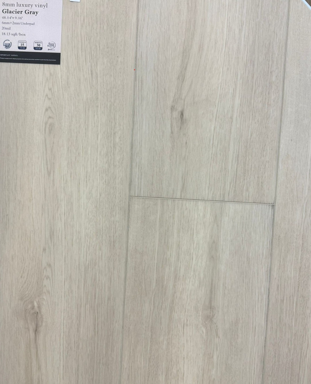 Glacier Gray 8mm SPC vinyl plank samples, showcasing a smooth matte finish, high durability, and easy maintenance for residential or commercial projects.
