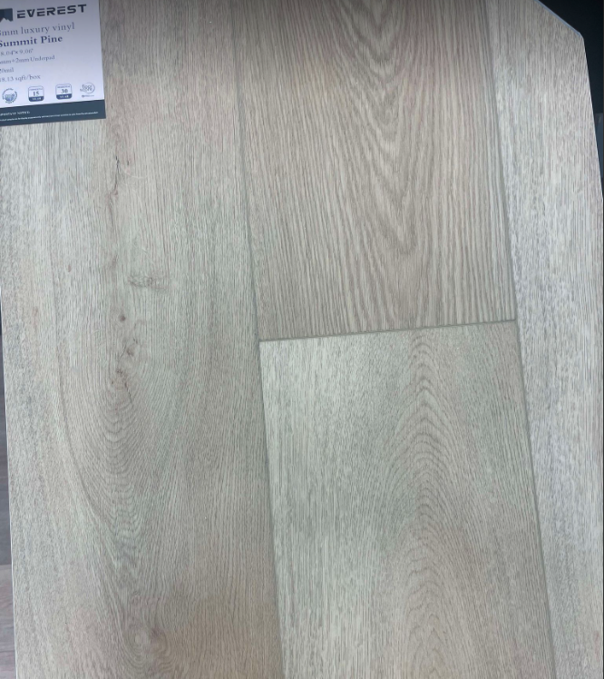 Summit Pine SPC vinyl plank samples, showcasing smooth matte finish, high durability, and easy maintenance for residential or commercial projects.