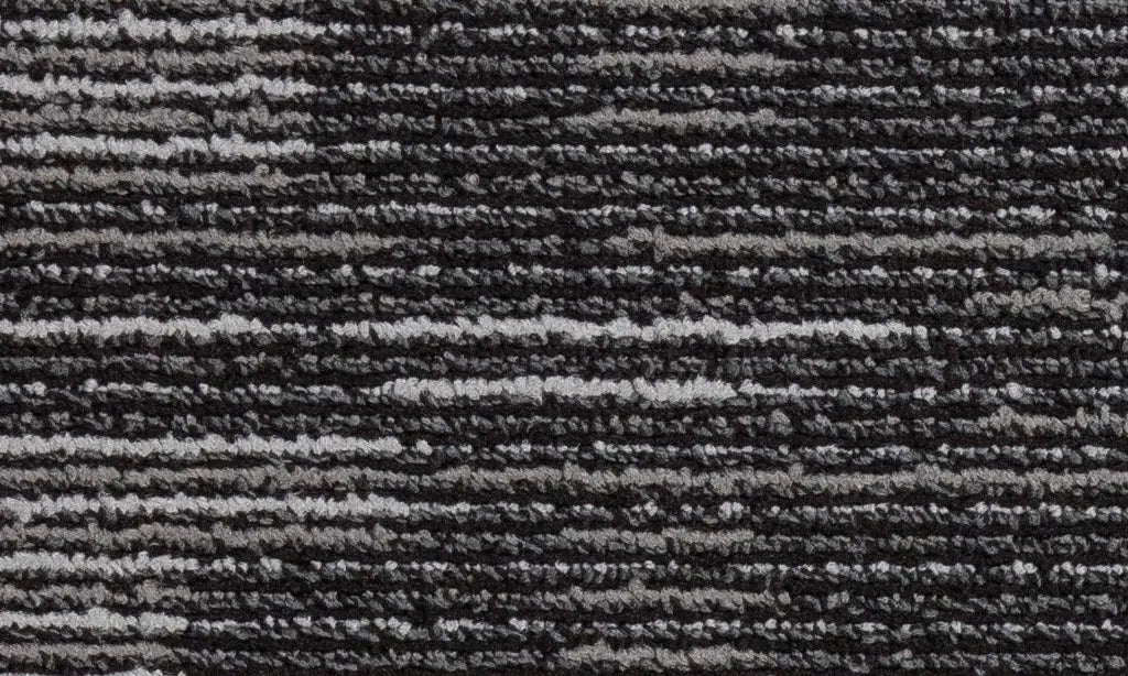 Textured black and gray patterned carpet
