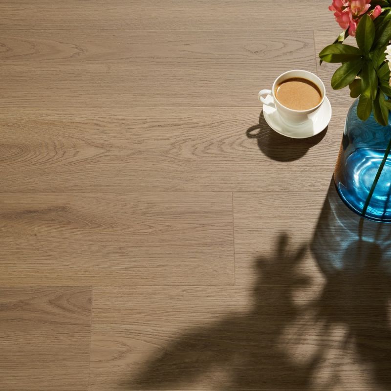 Close-up view of Grandeur Inov8 SPC vinyl flooring in Lion’s Head shade, showing realistic wood grain detail and matte surface finish.