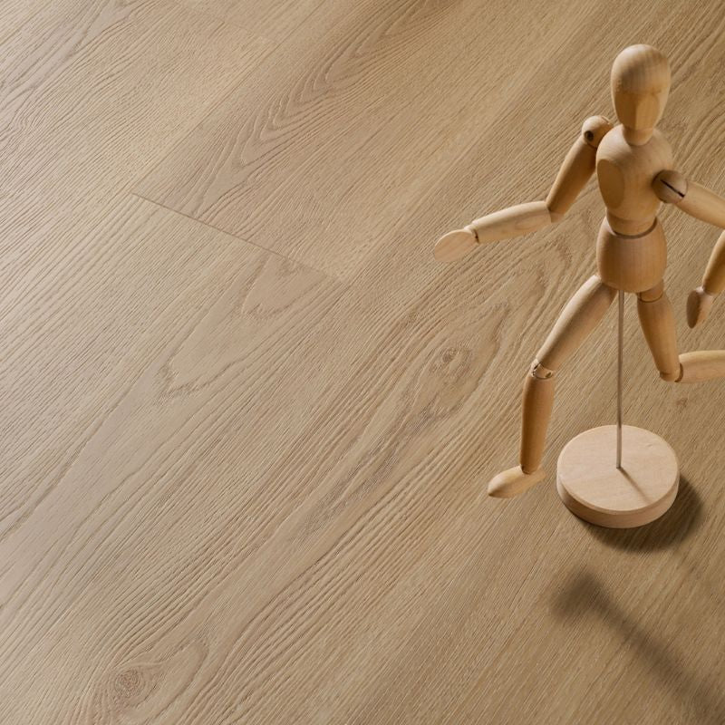 Close-up view of Grandeur Inov8 SPC vinyl flooring in Manitoulin color, featuring detailed wood grain pattern and smooth matte surface.