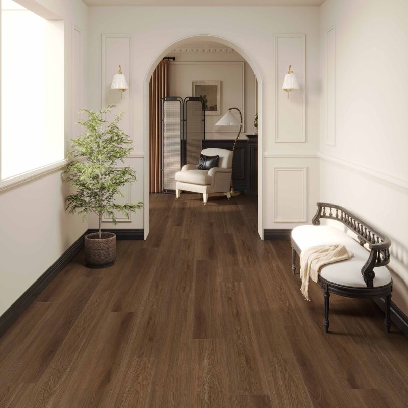 Hallway interior featuring Grandeur Inov8 SPC vinyl flooring in Peninsula color, highlighting rich brown wood tones and realistic grain detail.