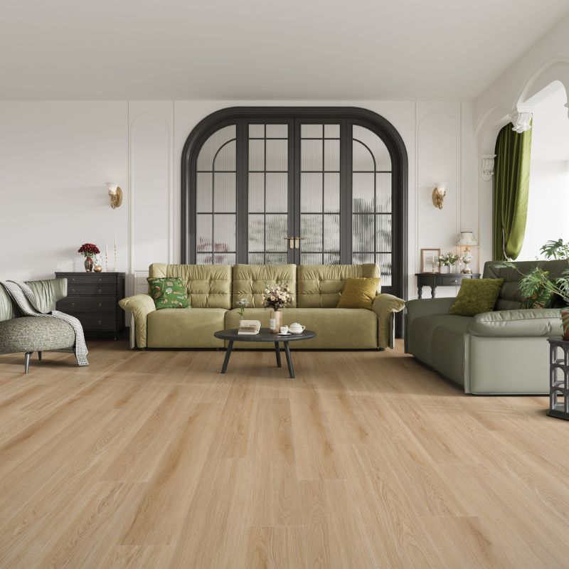 Living room interior showcasing Grandeur Inov8 SPC vinyl flooring in Tobermory color, with warm natural oak finish adding brightness and modern appeal.