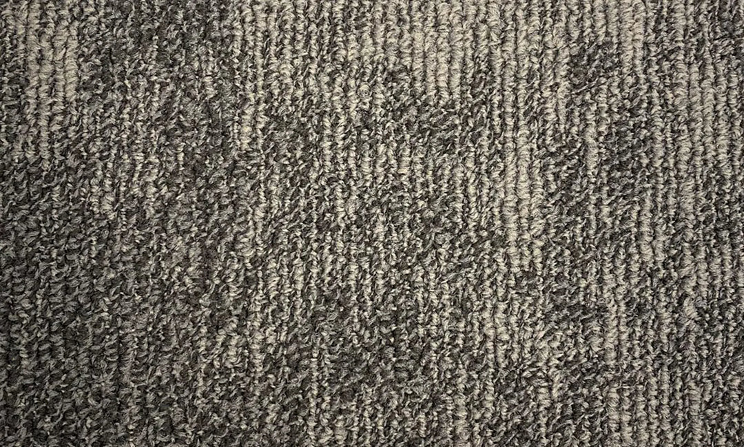 Textured brown and gray carpet pattern