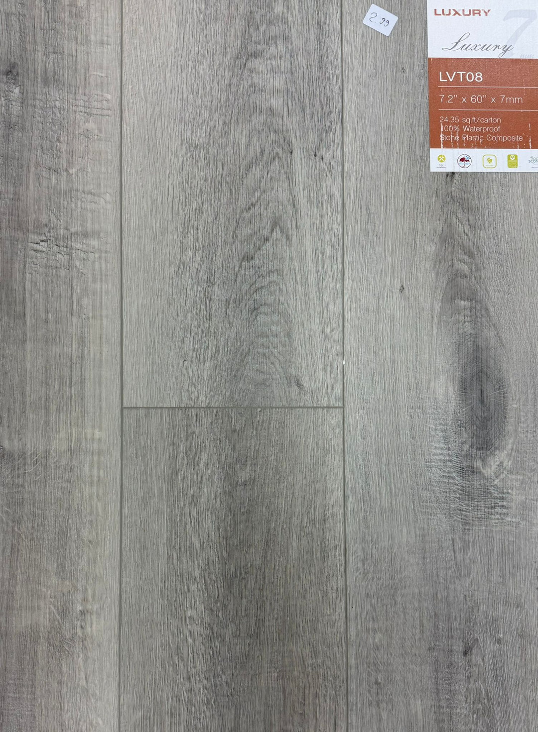 Gray wood-patterned flooring with a label in the top right corner.