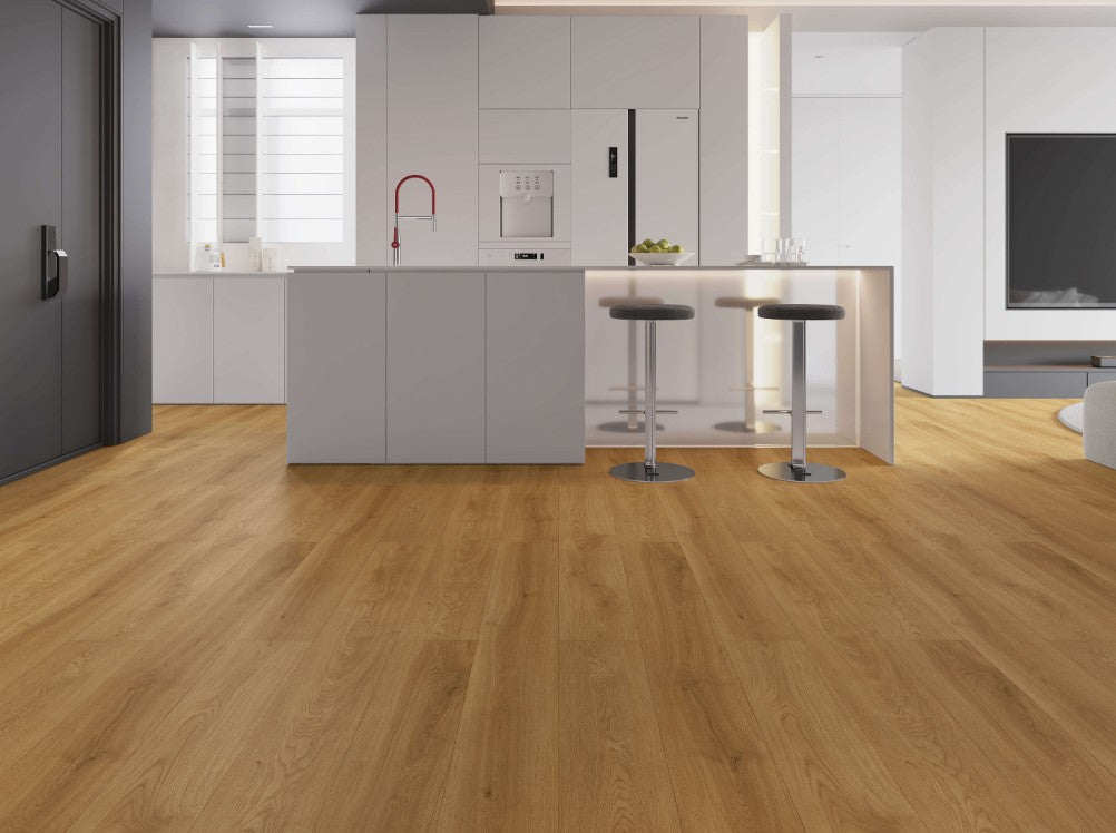 LV323 Tremblant medium oak wood flooring in a modern, minimalist kitchen and living room setting with white cabinetry and two bar stools. Waterloo & Kitchener 