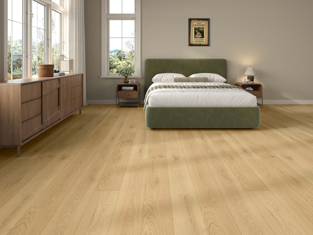 LV324-Niseko light oak laminate flooring in a modern bedroom setting, shown from a low angle. Available at Advanced Flooring