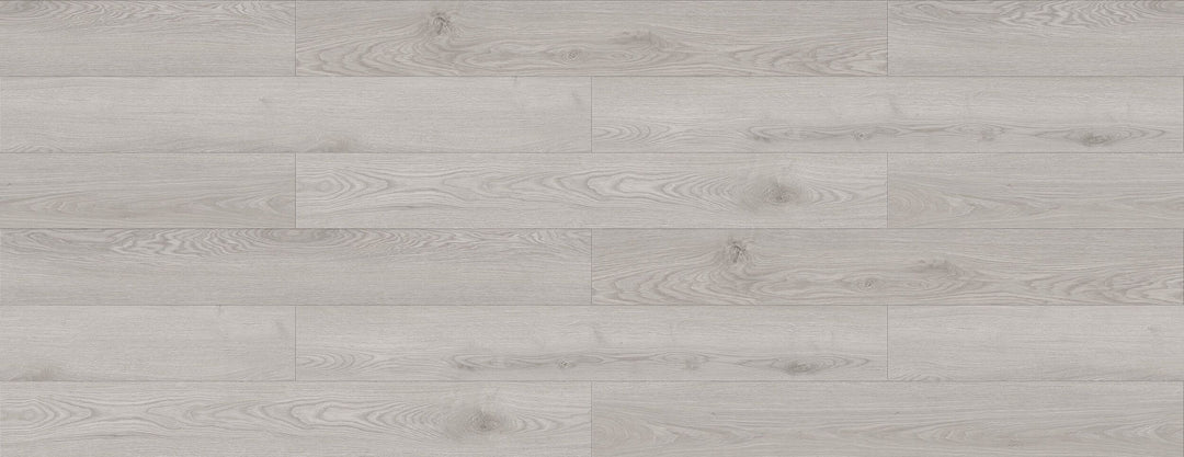 LV325 Cypress light gray wood-look laminate flooring planks from the Lavo with subtle grain patterns and natural texture. Available at KW and close areas.
