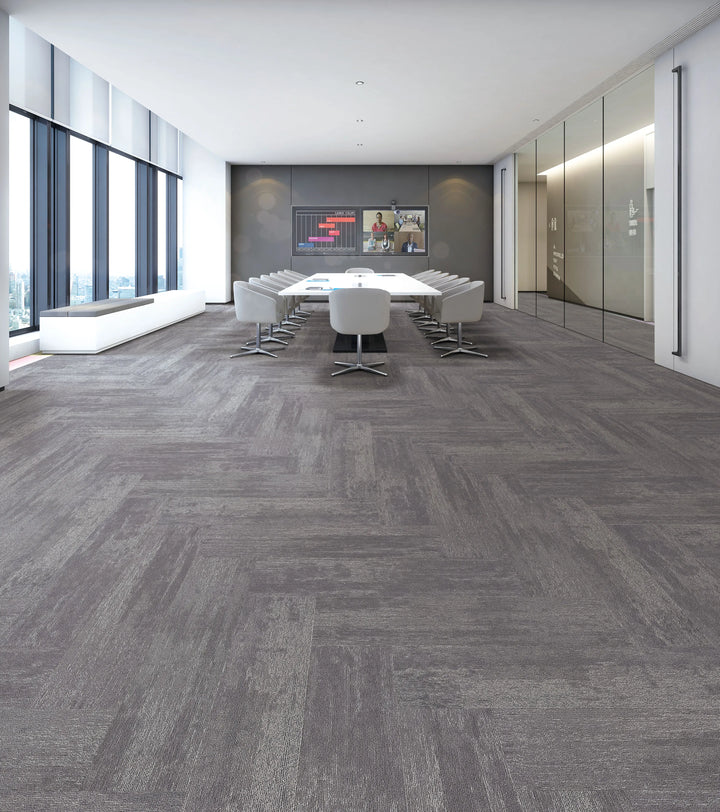 Modern office conference room with gray herringbone patterned carpet