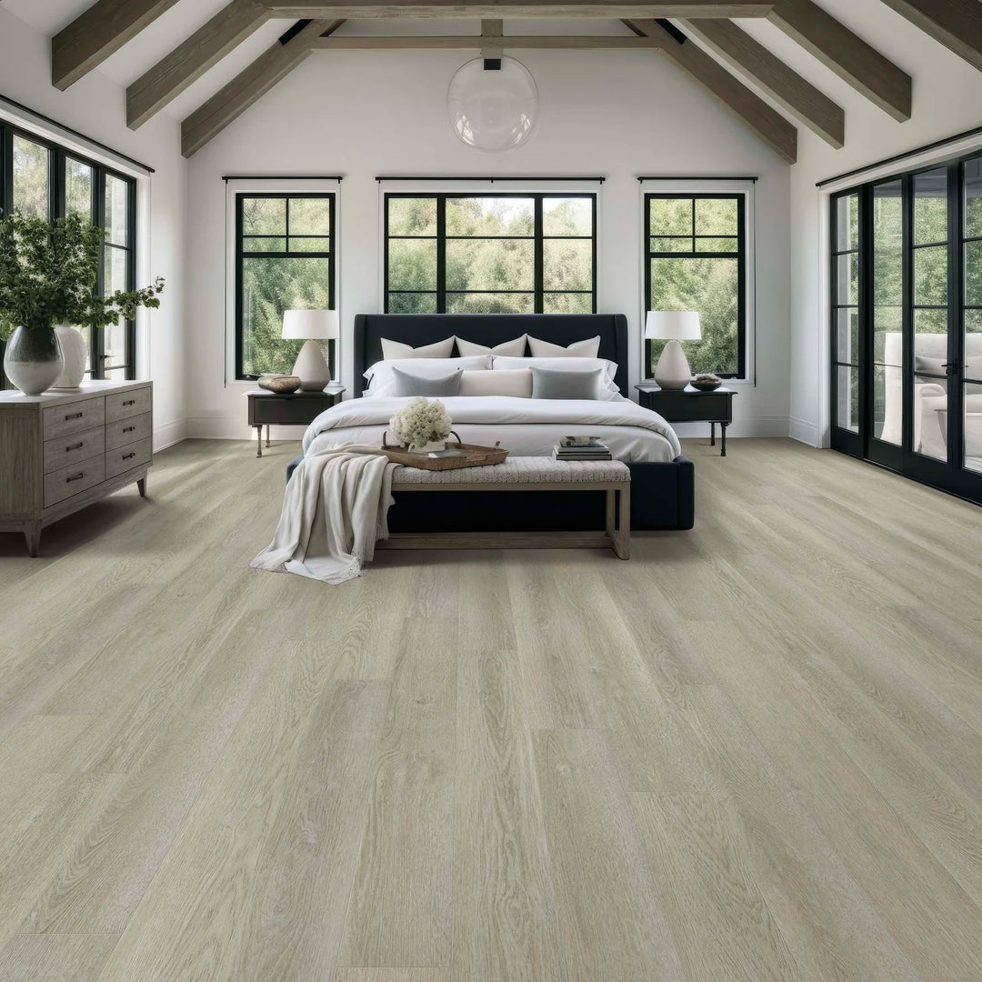 Modern bedroom with wooden flooring, large windows, and a bed.
