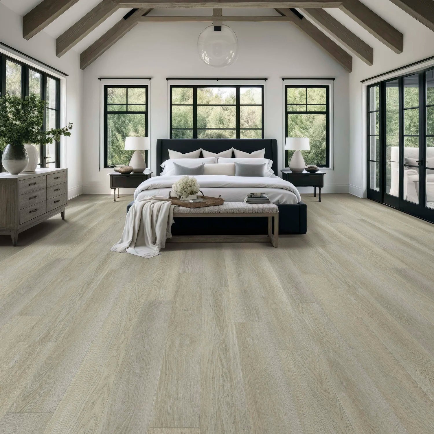 Modern bedroom with wooden flooring, large windows, and a bed.