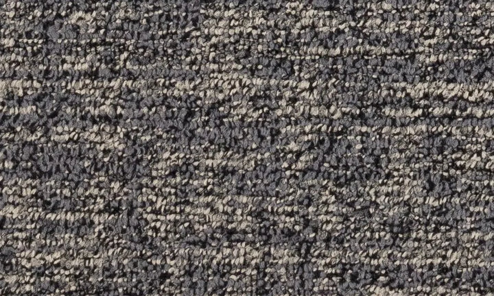 Close-up of textured black and beige carpet