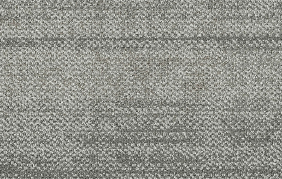 Close-up of a textured gray fabric surface