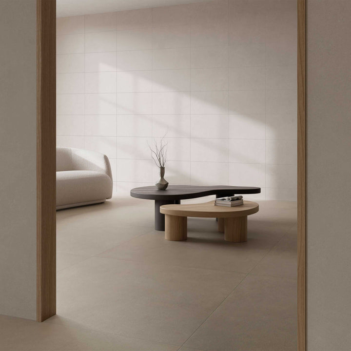 Modern living room with minimalistic furniture and neutral color palette.