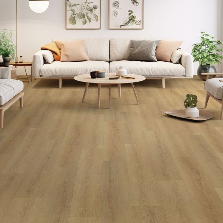 Living room with wooden flooring, white sofa, and decorative elements.