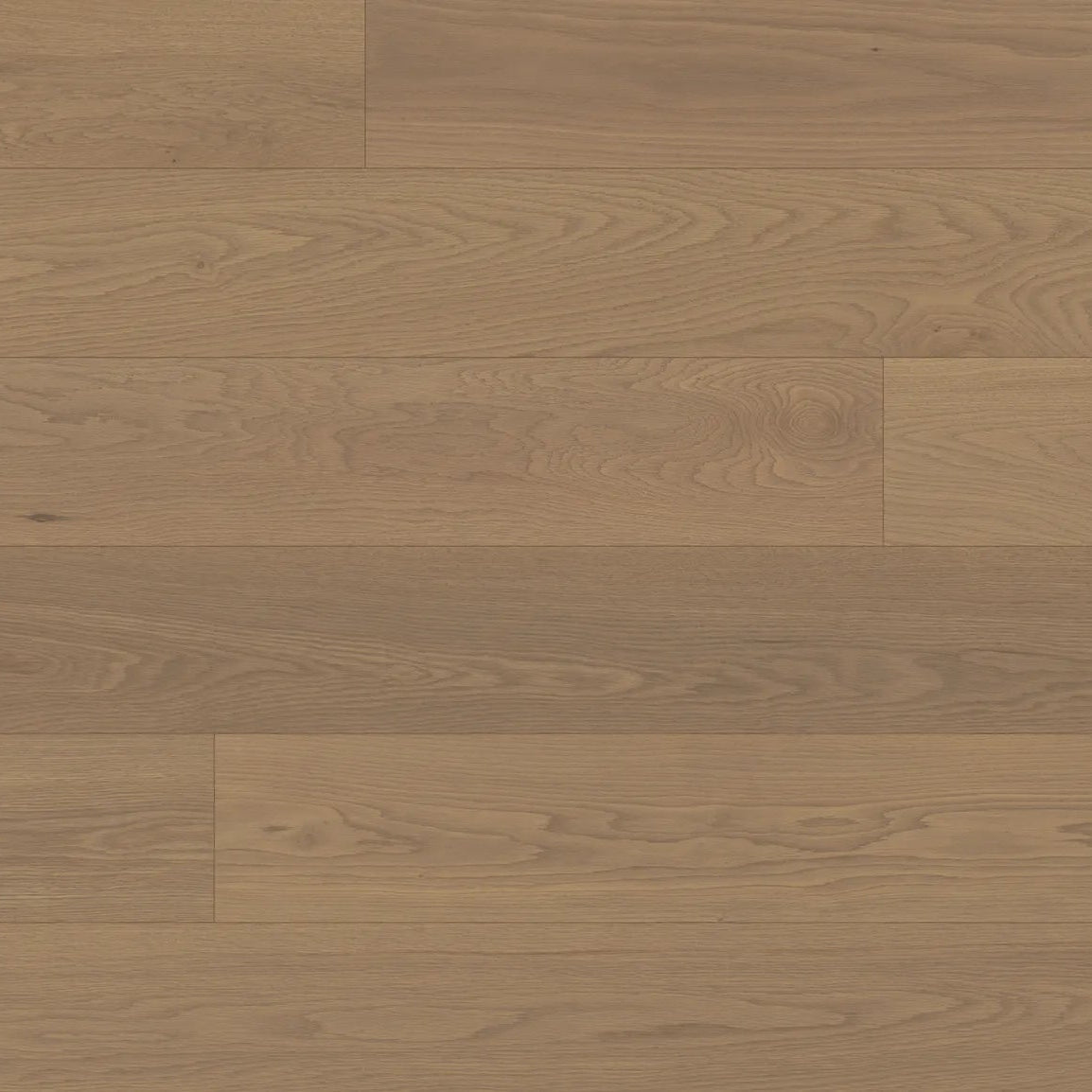Close-up of wooden flooring with a warm brown color.