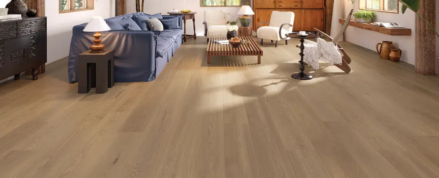 Wooden flooring in a living room setting with furniture.