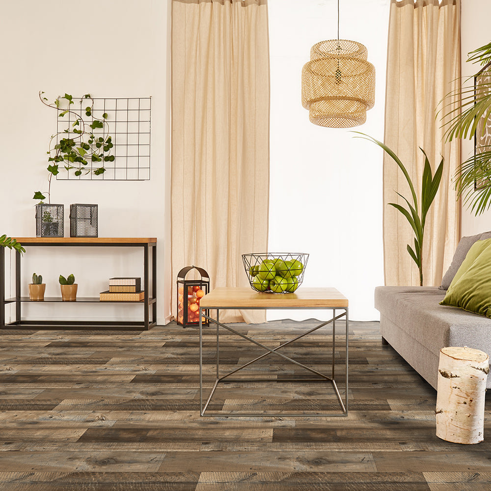 Modern living room with wooden flooring, furniture, and decorative elements.