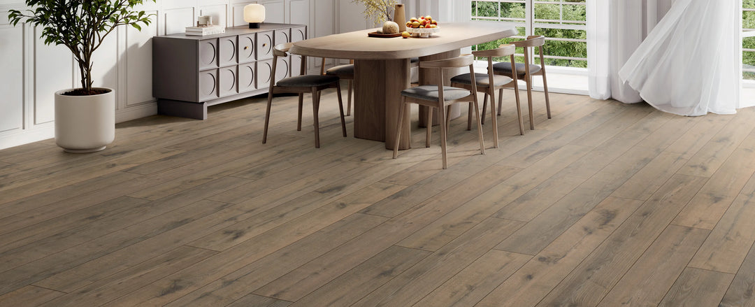 Wooden flooring with a dining area in the background