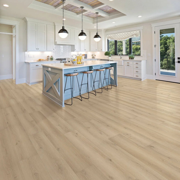 Modern kitchen area with Toasted Almond Oak WPC vinyl plank flooring – light brown oak tone, wood texture, waterproof and durable for busy Canadian households.