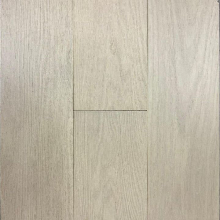 Sleek Oak engineered hardwood flooring sample – light oak tone with wire-brushed finish and 7½-inch wide planks – available in Ontario and across Canada.