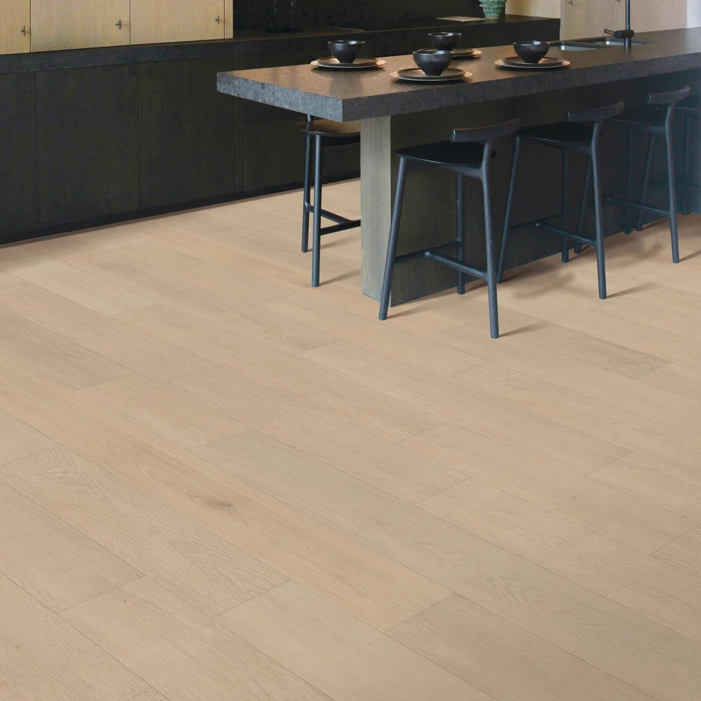 Kitchen with Sleek Oak engineered hardwood floors – light oak color adds bright modern look – wide plank flooring popular in Ontario homes.