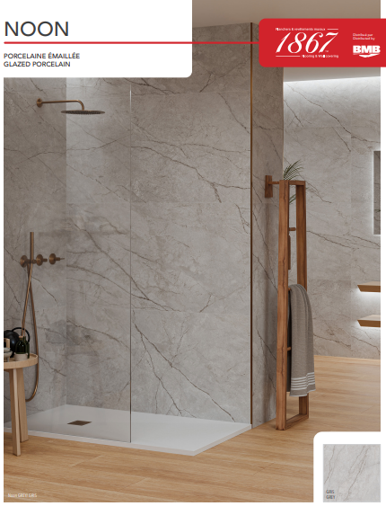 Shower area with marble-patterned tiles, wooden towel rack, and 'NOON' branding.