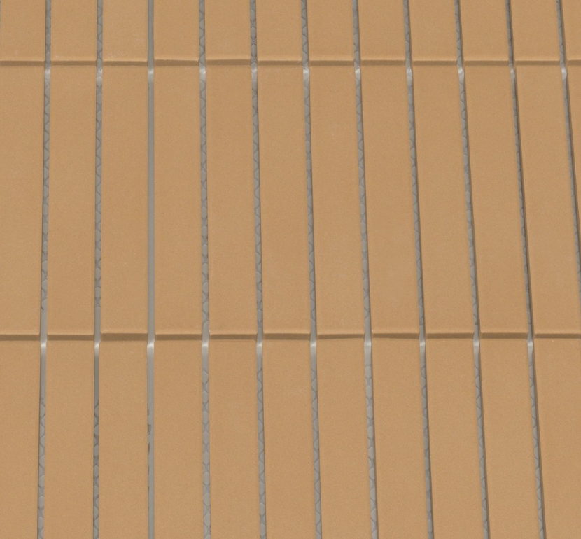 Close-up of brown tiles with vertical grout lines