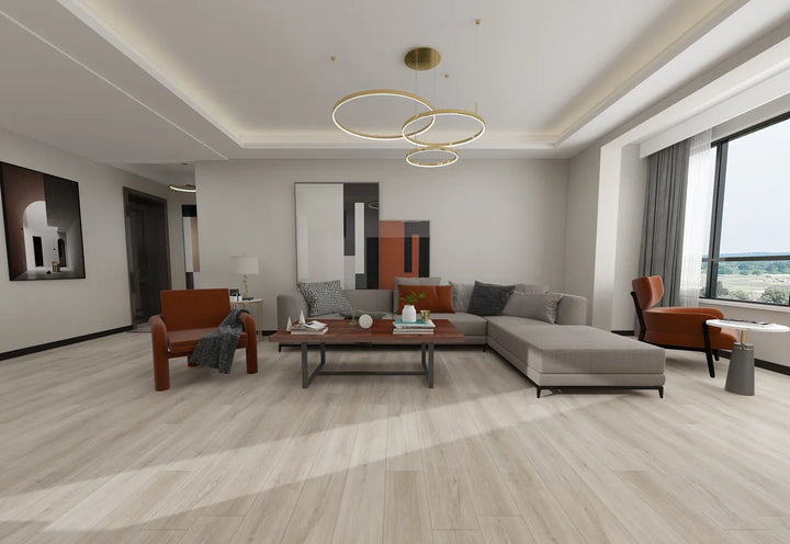 Modern living room with gray sectional sofa, wooden coffee table, and armchairs.