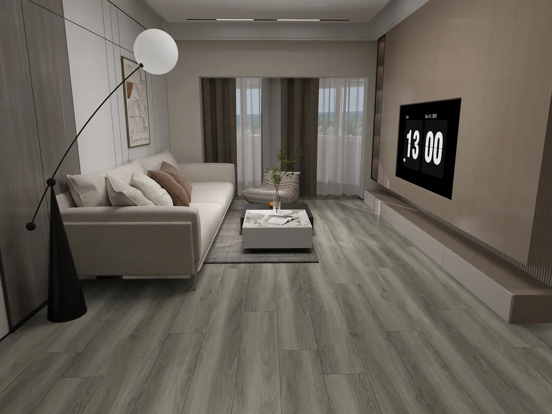 Modern living room with a sofa, coffee table, and digital clock on the wall.