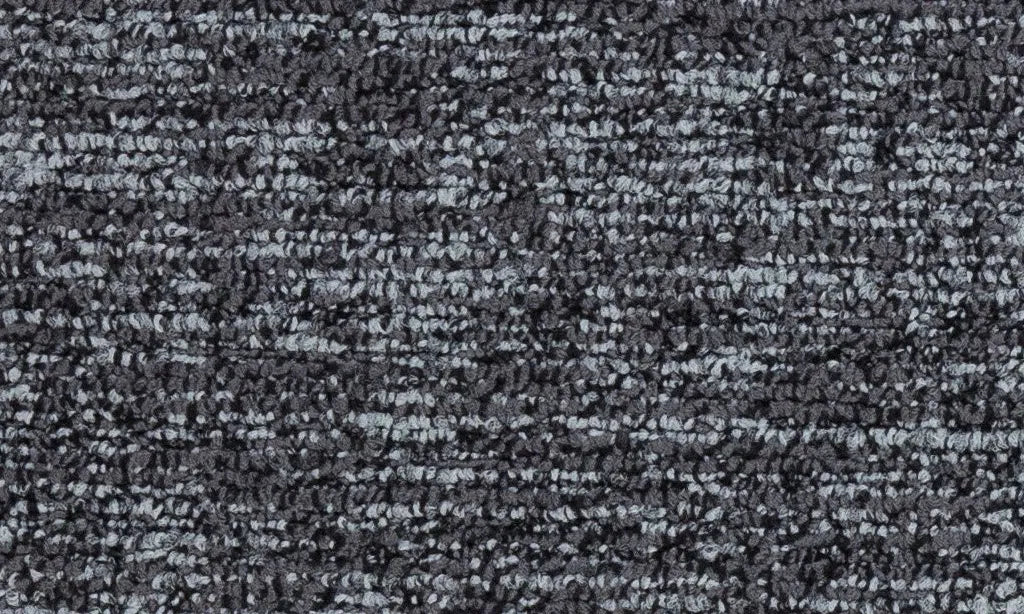 Close-up of a textured gray carpet