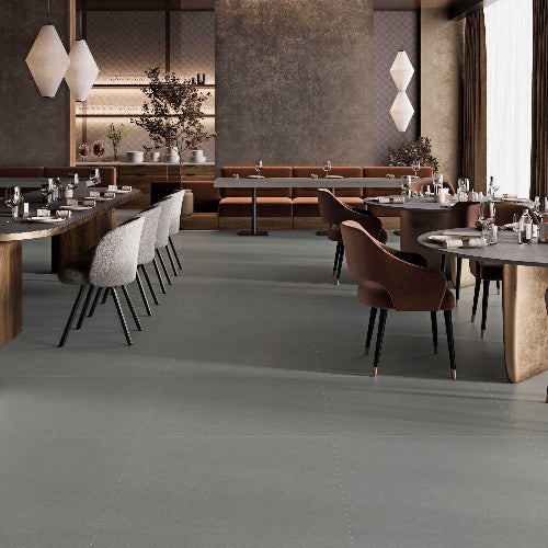 Modern restaurant interior with tables, chairs, and decor.