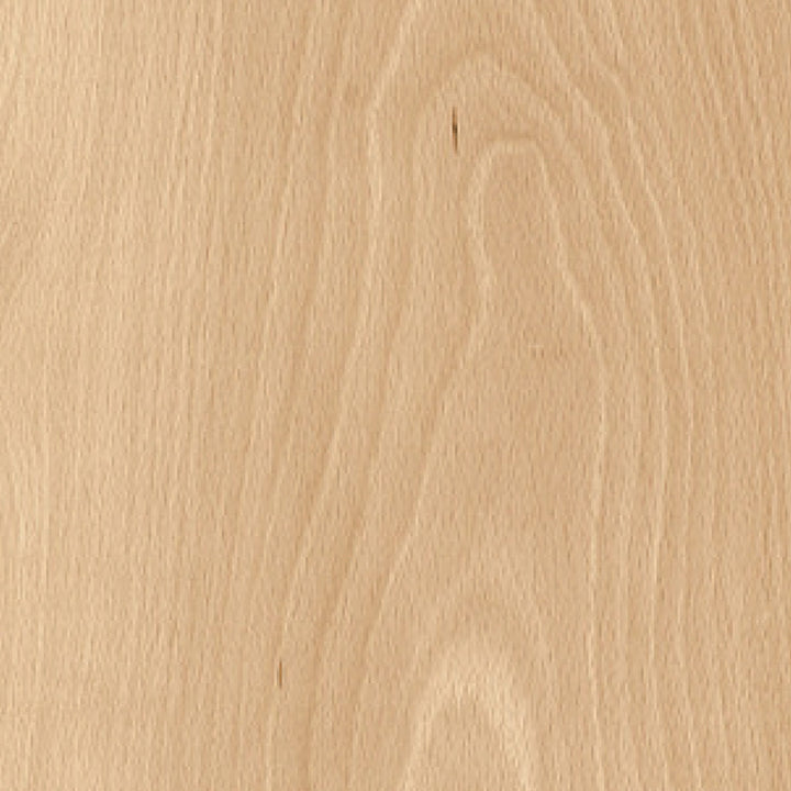 Close-up of a wooden surface with a light brown color and visible grain pattern.