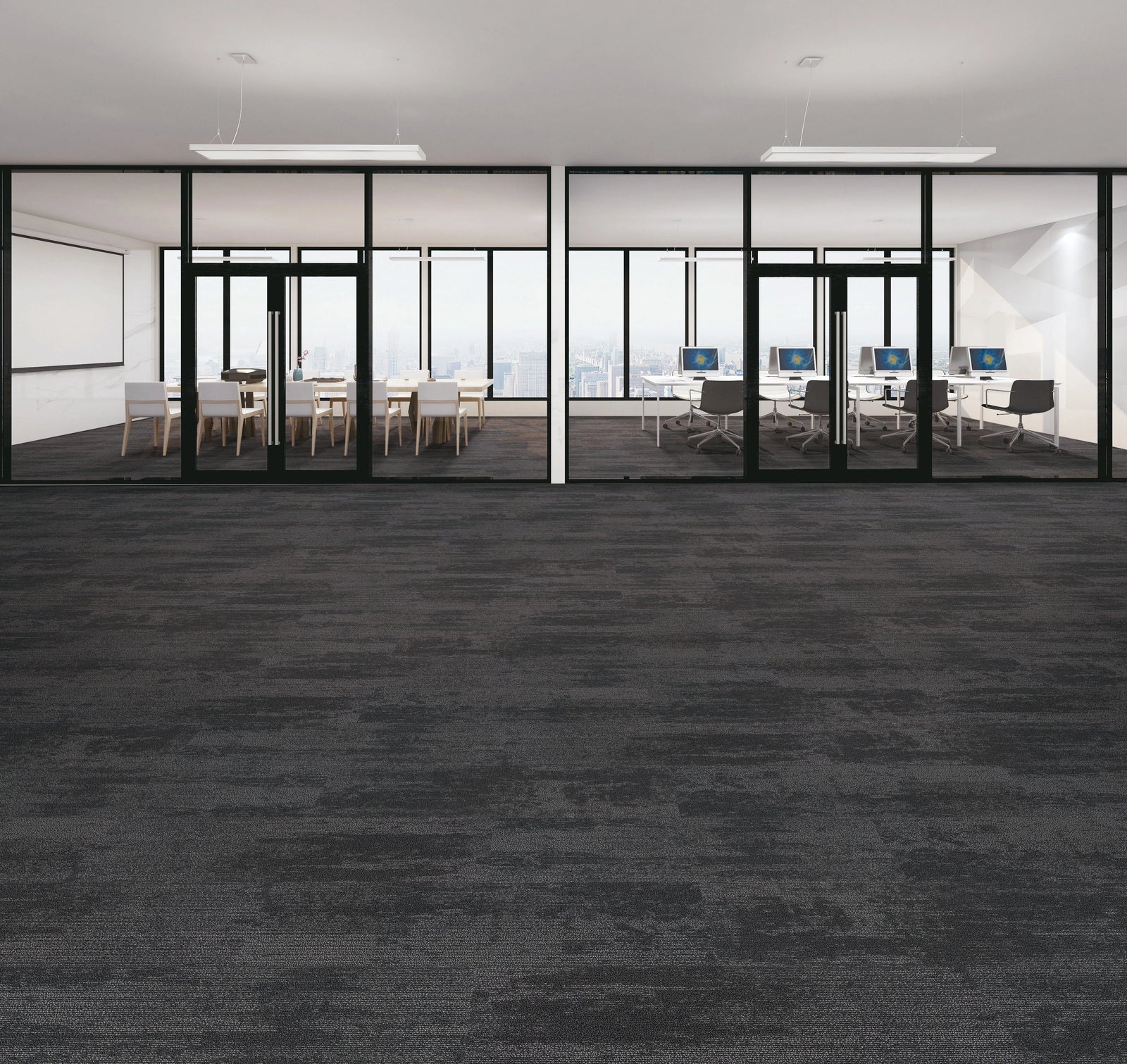 Modern office space with glass walls and carpeted floor