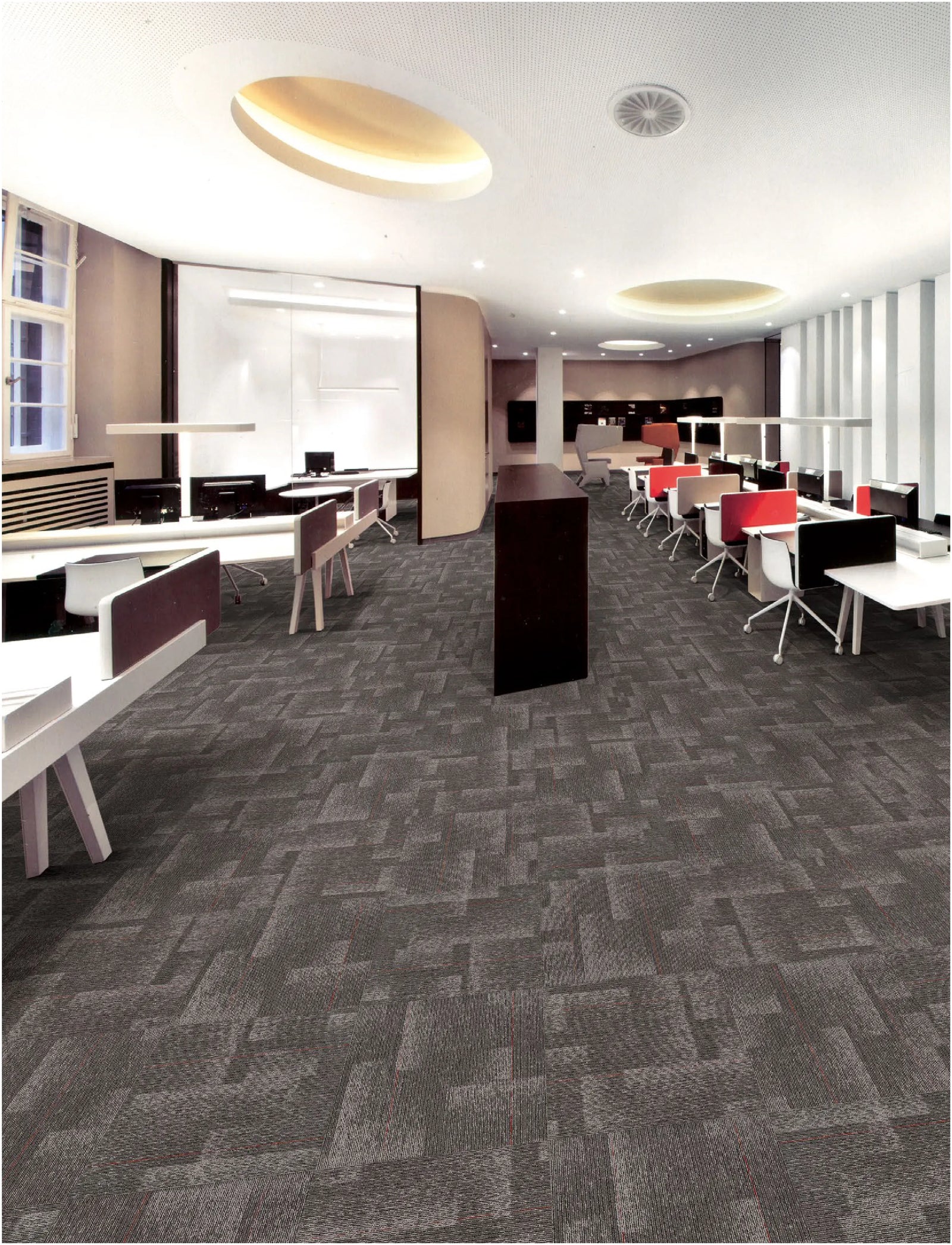 Modern office interior with gray patterned carpet and office furniture.