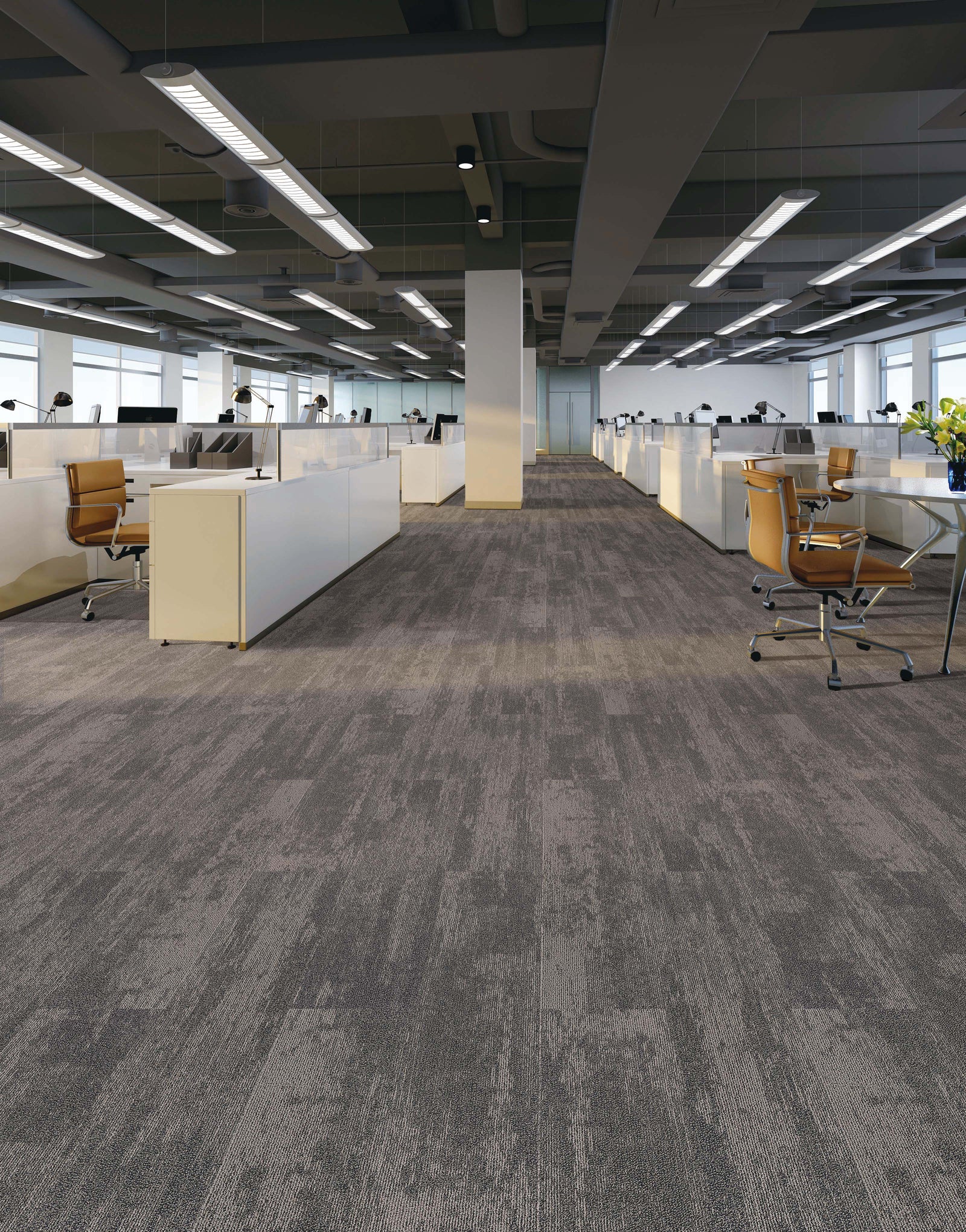 Modern office with gray carpeted floors and beige walls