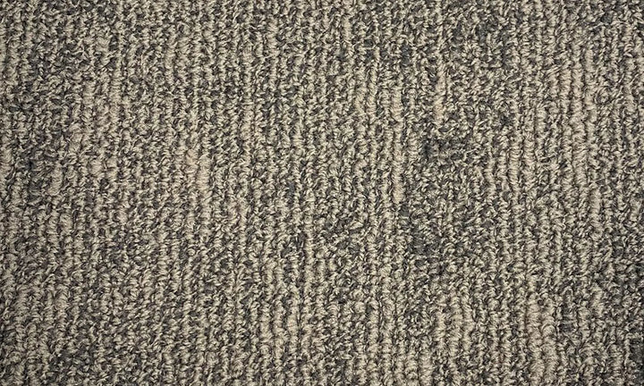 Textured brown carpet surface
