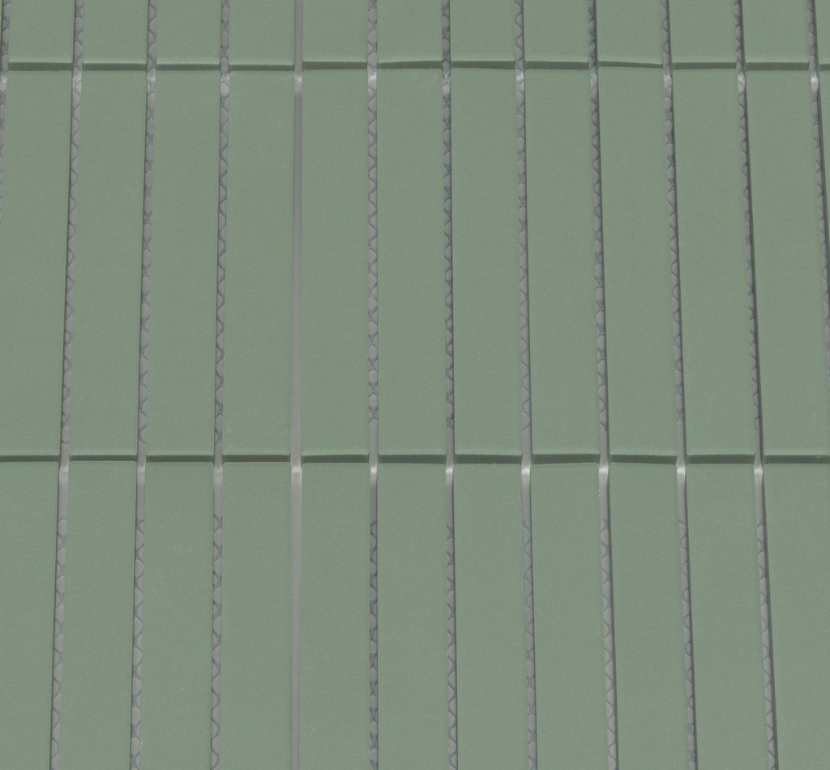 Close-up of green tiles with visible grout lines
