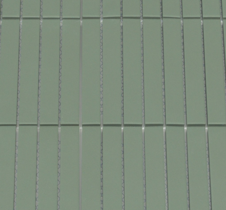 Close-up of green tiles with visible grout lines