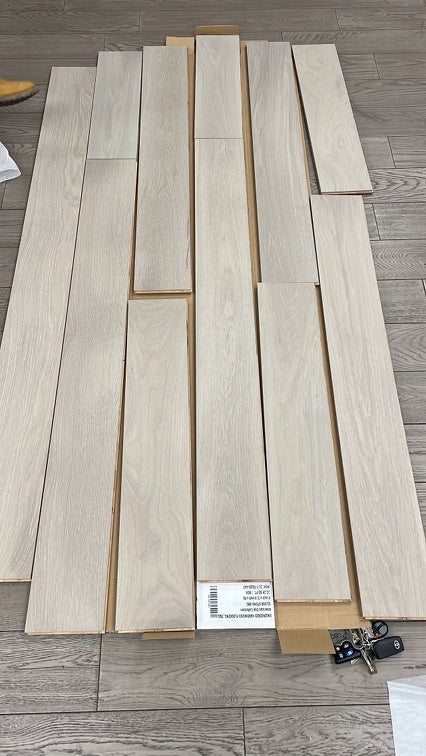 Planks of Silver Stone VIDAR premium American Oak engineered hardwood flooring.