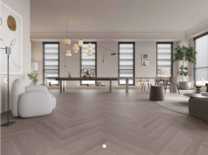 A modern room which displays the beautiful look of Silver Stone premium herringbone engineered hardwood flooring from Vidar.