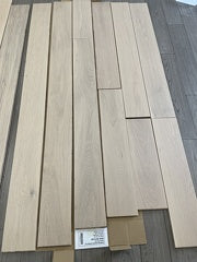 Planks of Snowwhite VIDAR premium American Oak engineered hardwood flooring.