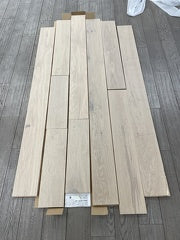 Planks of Snowwhite VIDAR premium American Oak engineered hardwood flooring.