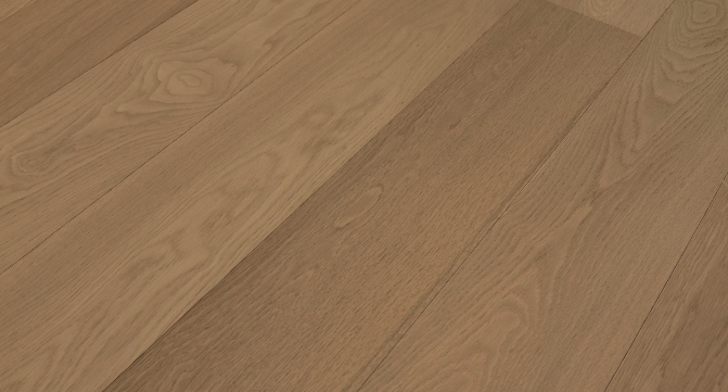 Close-up of a wooden floor with a warm brown color and visible grain.