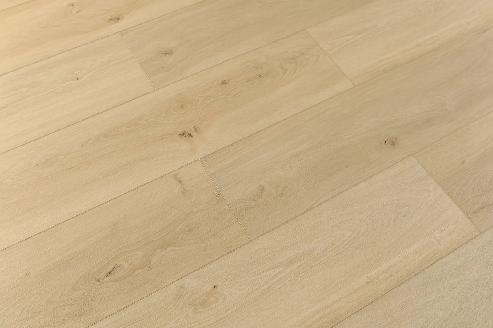 Close-up of a wooden floor with light brown planks