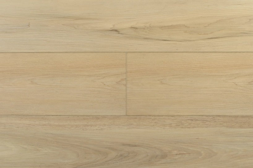 Close-up of a Toucan vinyl floor with a light brown color and visible grain pattern. Available in Waterloo & Kitchener