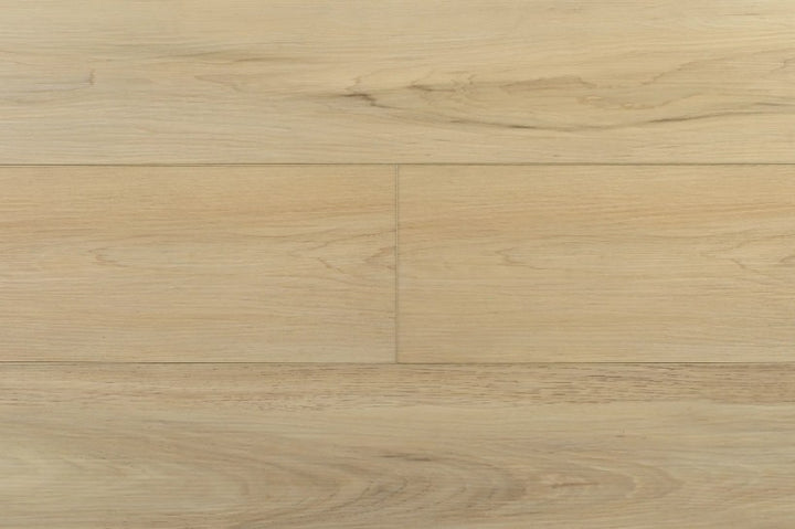 Close-up of a Toucan vinyl floor with a light brown color and visible grain pattern. Available in Waterloo & Kitchener
