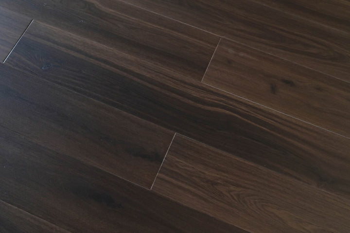 A close up of Deep Walnut TFSPC902 9mm vinyl flooring from Toucan.